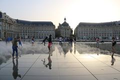 Historic cityscape of Bordeaux with classical architecture and Garonne River