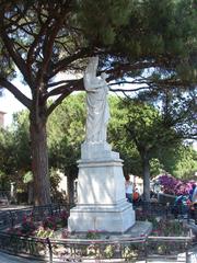 The Statue in a landscaped garden