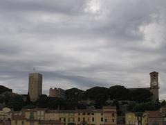 View of the Suquet Tower, Chapelle Sainte-Anne, Notre-Dame-de-l'Espérance Church, and Place de la Castre