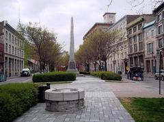 Place de la Grande-Paix-de-Montréal with obelisk and well