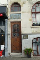 Art Nouveau door and stained glass at No. 7 Place de la Résistance, Anderlecht