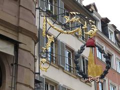 Antiquités Bastian hanging sign in Strasbourg