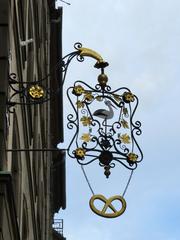 Old L. Gangloff bookstore hanging sign in Strasbourg