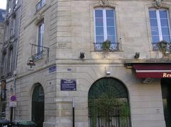 Bordeaux Place du Parlement with market and street signs