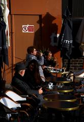 People drinking at a café in Montmartre, Paris