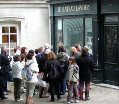 Building with a showcase dedicated to the history of Bateau-Lavoir in Montmartre, Paris