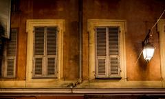 windows of old city buildings in Nice, France