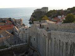 scenic coastal view of Croatia with clear blue water and historic architecture