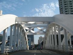 Elgin Bridge at night with illuminated structure and reflection on river