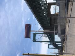 Walt Whitman Bridge spanning across a river on a clear day