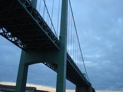 Scenic view of Bridge 2 over a river with green trees on both sides