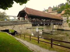 the covered wooden bridge in the city of Fribourg