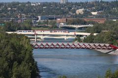 Calgary bridges with a train on a sunny day