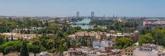 Seville cityscape with Guadalquivir River and bridges