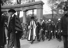 McGill graduation procession passing Roddick Gates, Montreal, 1930