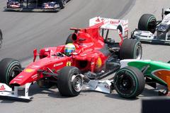 Felipe Massa and Vitantonio Liuzzi collide on lap 1, turn 2