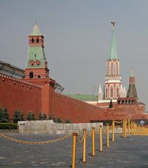 View of Red Square in Moscow featuring Senate Tower, Lenin's Mausoleum, Nicholas Tower, and Arsenal Corner Tower