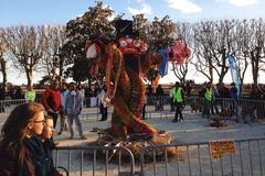 Occitan carnival festivities with people in colorful costumes and masks