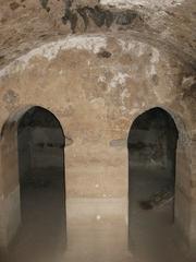 Inside the cistern behind the fountain next to Qubbat al-Bu'diyyin