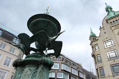 The Stork Fountain at Amagertorv in Copenhagen with three storks depicted about to set off