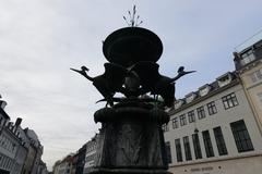 Amagertorv square in Copenhagen with Stork Fountain and historic buildings