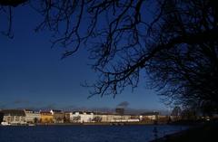 Copenhagen cityscape with Peblinge Lake and historic buildings