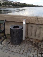 cup trash test tubes on the ground