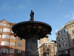 Caritasbrønden sculpture detail at Gammeltorv in Copenhagen