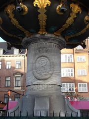 Christian VII's monogram on Caritas Fountain in Gammeltorv, Copenhagen