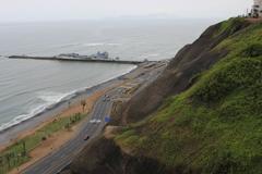 Miraflores District in Lima, Peru with oceanfront buildings and lush green parks