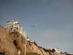 Malecón and cliffs of Miraflores with Costa Verde in the background