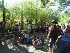 People participating in a historical walk at Horto Florestal in São Paulo