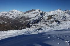 Western slope view of Aiguilles Rouges from Aiguillette des Houches