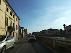 Panoramic view of Battaglia Terme town with buildings and lush greenery