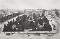 Elevated view of park with statues, streets, and buildings