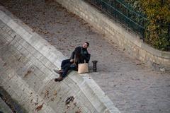 couple sitting on a bench in Paris