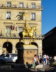 Golden equestrian statue of Jeanne d'Arc