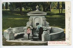 Woman and boy at Edmunds Well in Druid Hill Park around 1907