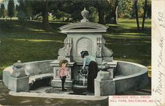 Woman and boy at Edmunds Well in Druid Hill Park, Baltimore, 1907