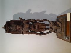 Wooden sculpture of Mahishasura Mardini