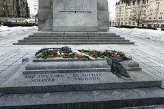 Secretary of Homeland Security John Kelly lays flowers at the Tomb of the Unknown Soldier in Ottawa