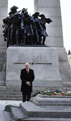 Secretary of Homeland Security John Kelly laying flowers on the Tomb of the Unknown Soldier in Ottawa