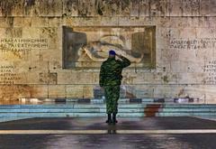 Presidential Guard soldier saluting at the Tomb of the Unknown Soldier in Syntagma Square, Athens