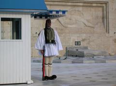 Evzone guard in front of the Greek Parliament building