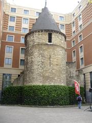 ancient stone tower under blue sky