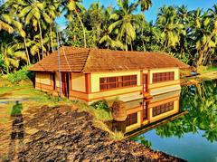 Sree Ananthapadmanabha Swamy temple in Kumbala, Kerala, with water tank and foot bridge