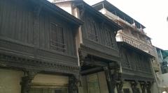 intricately carved wooden window in Ahmedabad