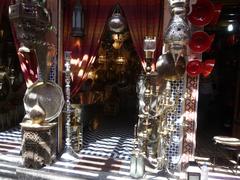 Street market in Marrakech with people and traditional lamps