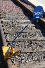 portable derail protecting a construction area