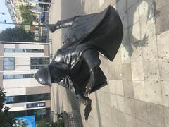 statue of a falling policeman in Molenbeek-Saint-Jean